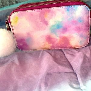Very cute wallet it has a card holder
